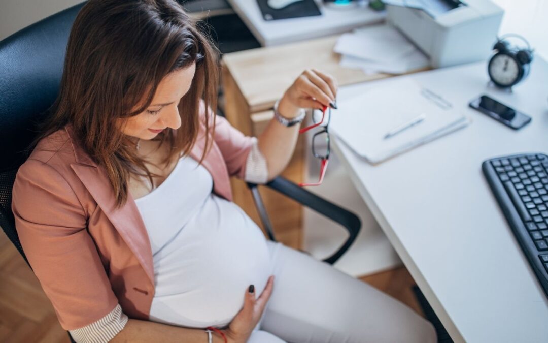 pregnant woman in office